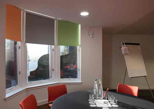Hope in a vibrant Glasgow meeting room, perfect for workshops and brainstorming sessions.