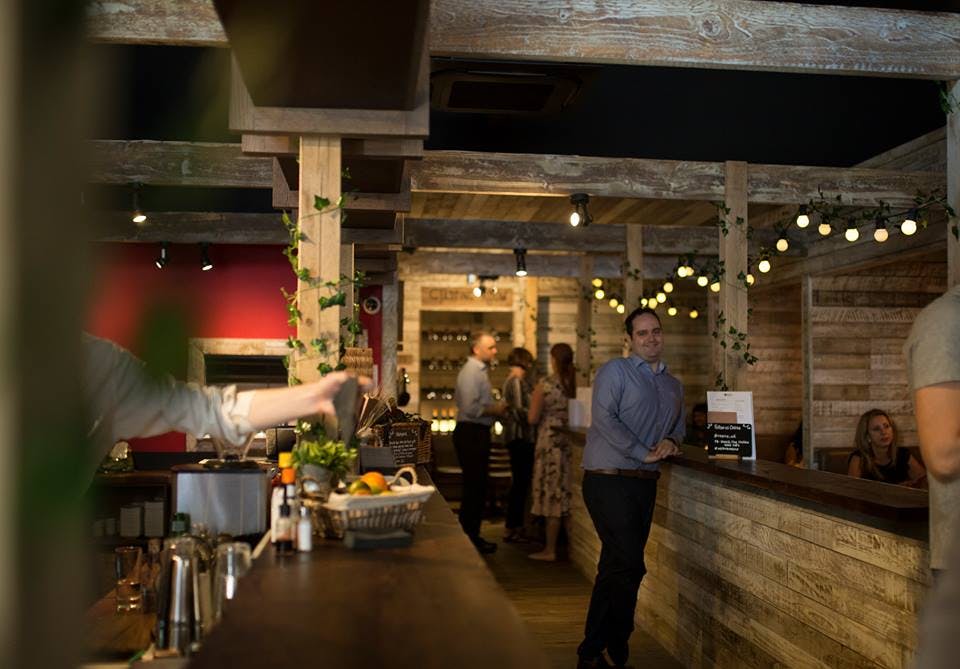 Vibrant venue with rustic decor for networking events in Veeno Italian Wine Bar, Edinburgh.
