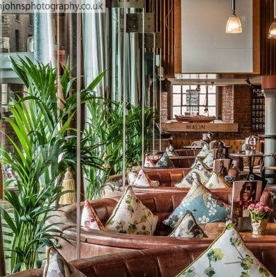 Stylish lounge at Dockside, Revolution Albert Dock, perfect for networking events.