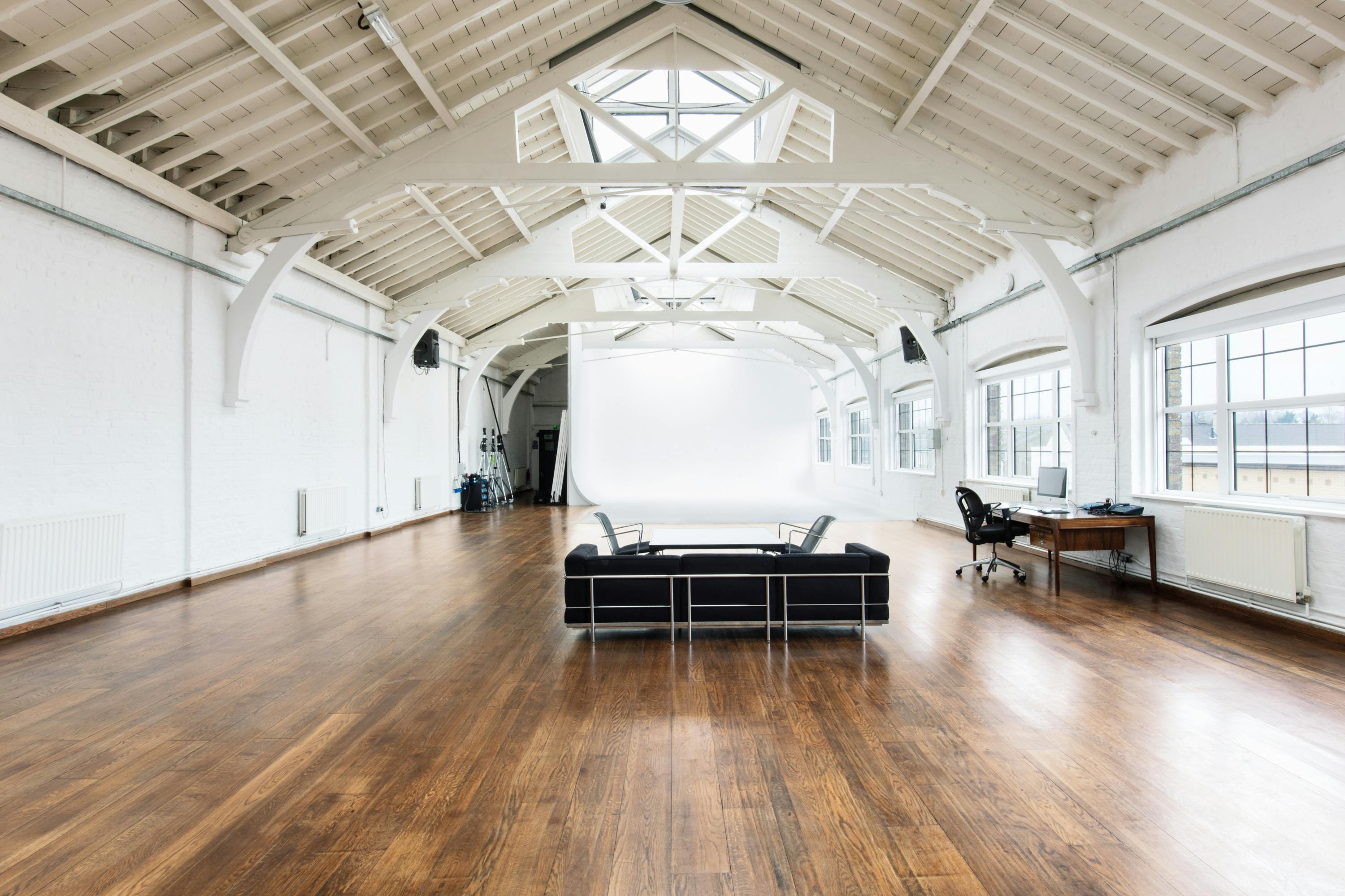 Spacious Studio A at Spring Studios, ideal for meetings and workshops with high ceilings.