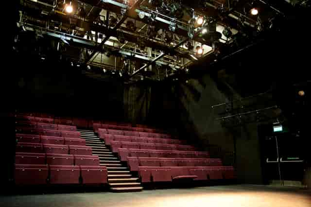 Versatile theater space with tiered seating for corporate events and performances in Birmingham.