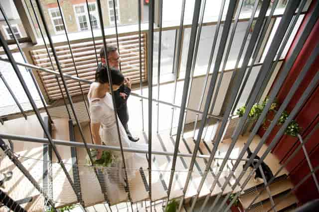 Stylish wedding venue in Siobhan Davies Studios with elegant staircase and natural light.