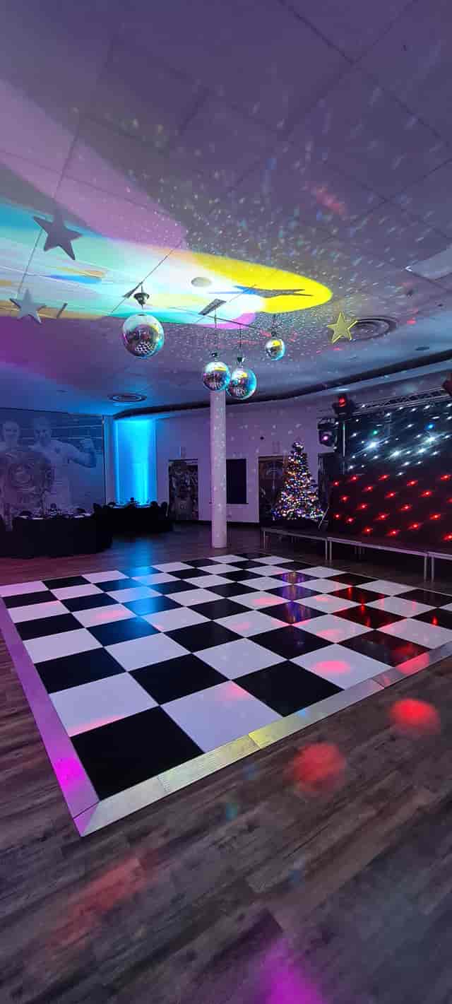 Chris Robshaw Bar with checkered dance floor, perfect for festive gatherings and events.