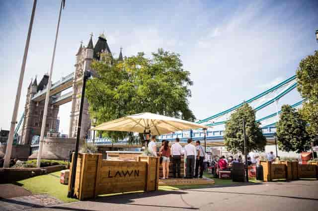 Outdoor event space at The Tower Hotel with Tower Bridge backdrop, ideal for networking.