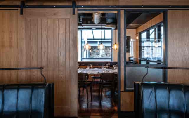 Private dining room at Heddon Street Kitchen, modern decor for events and gatherings.