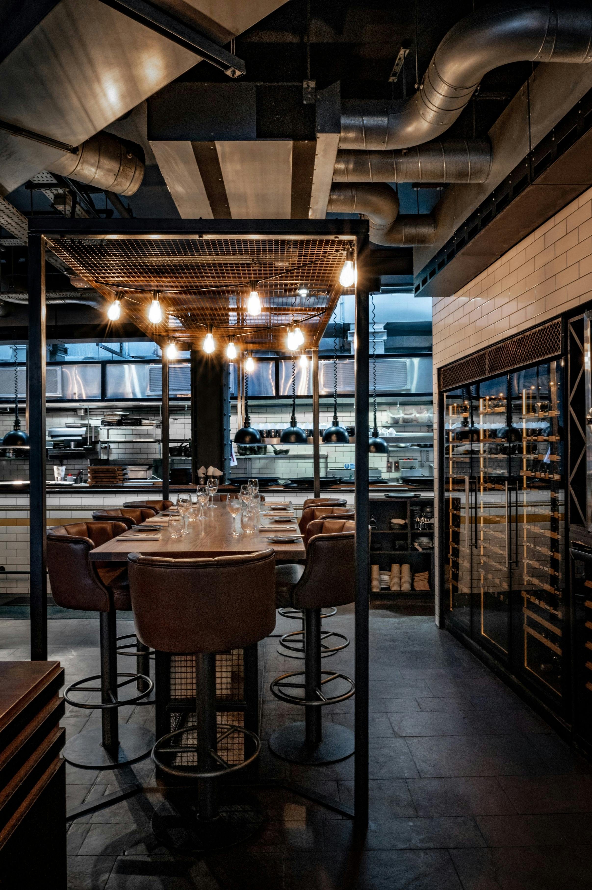 Stylish kitchen table in Heddon Street Kitchen, perfect for intimate gatherings and corporate dinners.