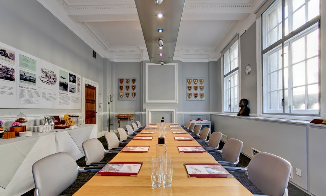 Frank Whittle in a bright, elegant meeting room for corporate discussions and workshops.