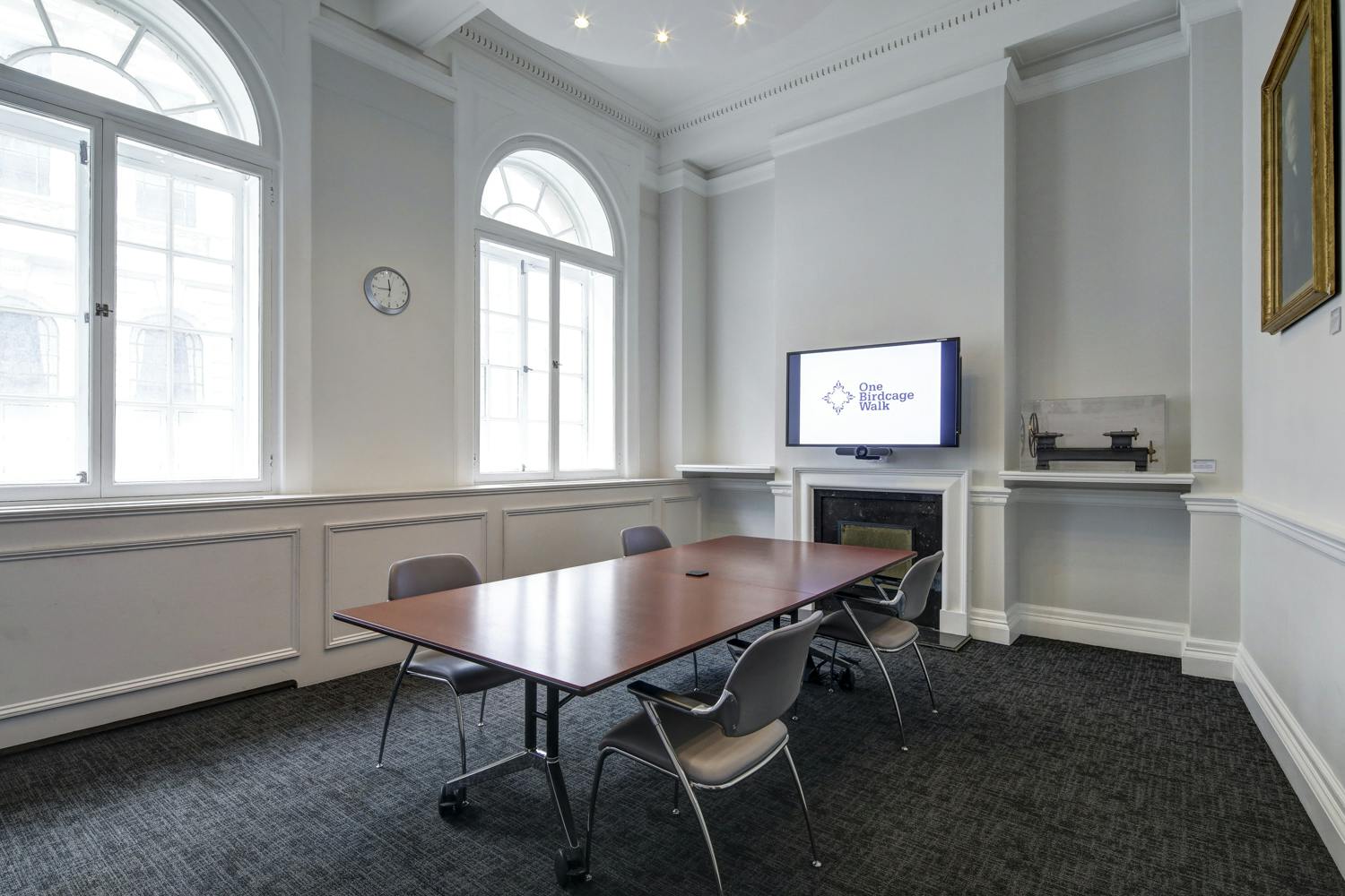 Joseph Whitworth meeting room with central table, ideal for professional gatherings.