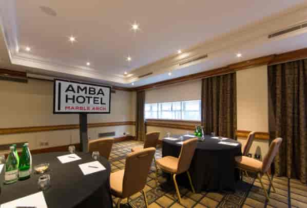 Meeting room at Amba Hotel Marble Arch, ideal for corporate conferences and workshops.