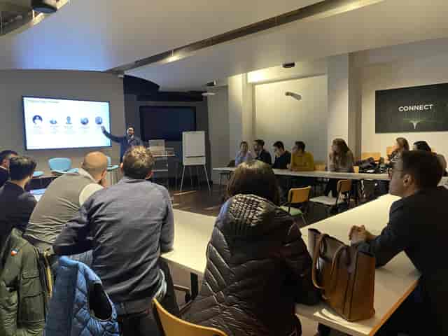 Event Space in IDEALondon with large screen for meetings and collaboration.