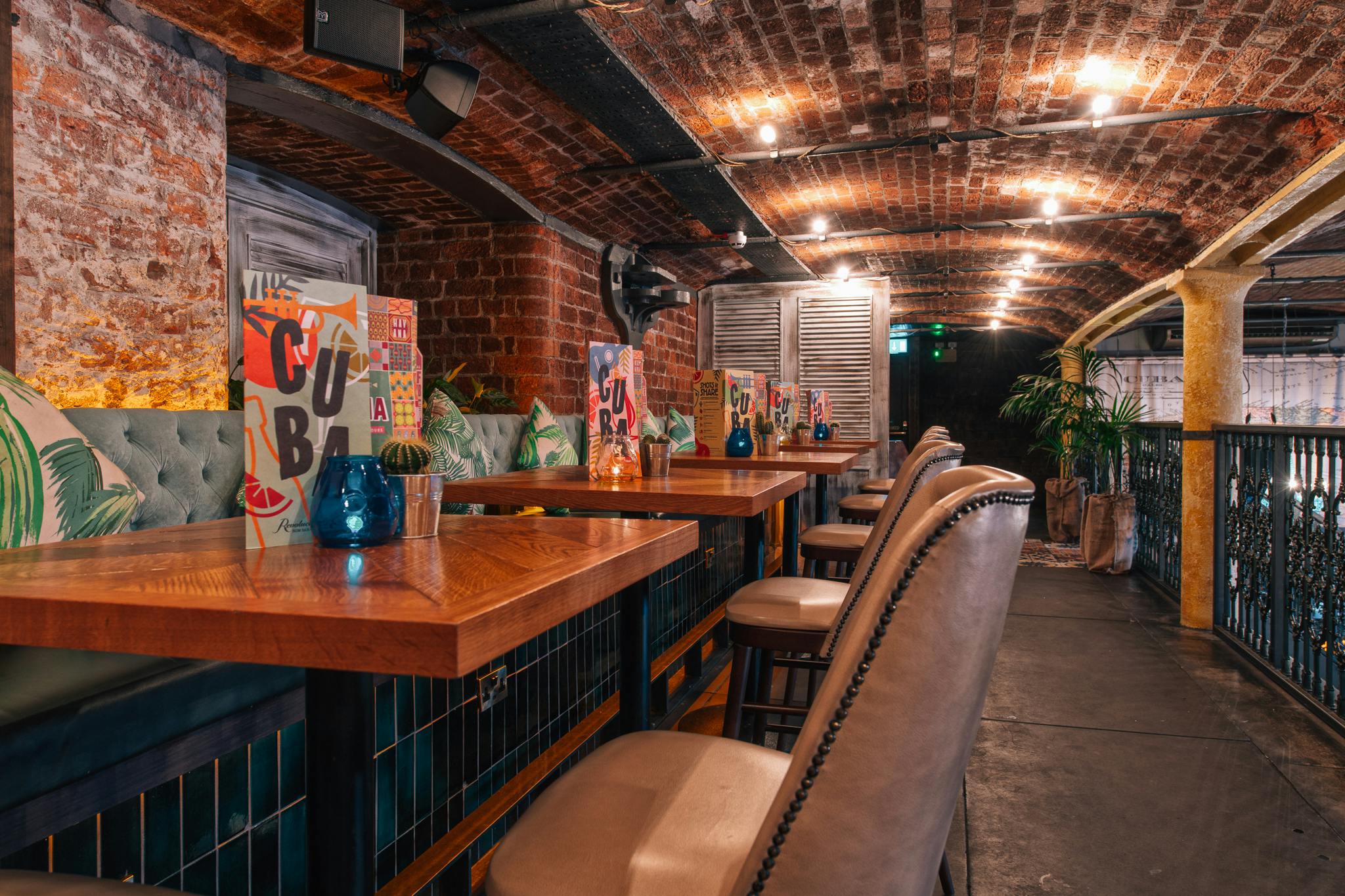 Stylish venue with exposed brick for intimate gatherings in Revolucion de Cuba Liverpool.