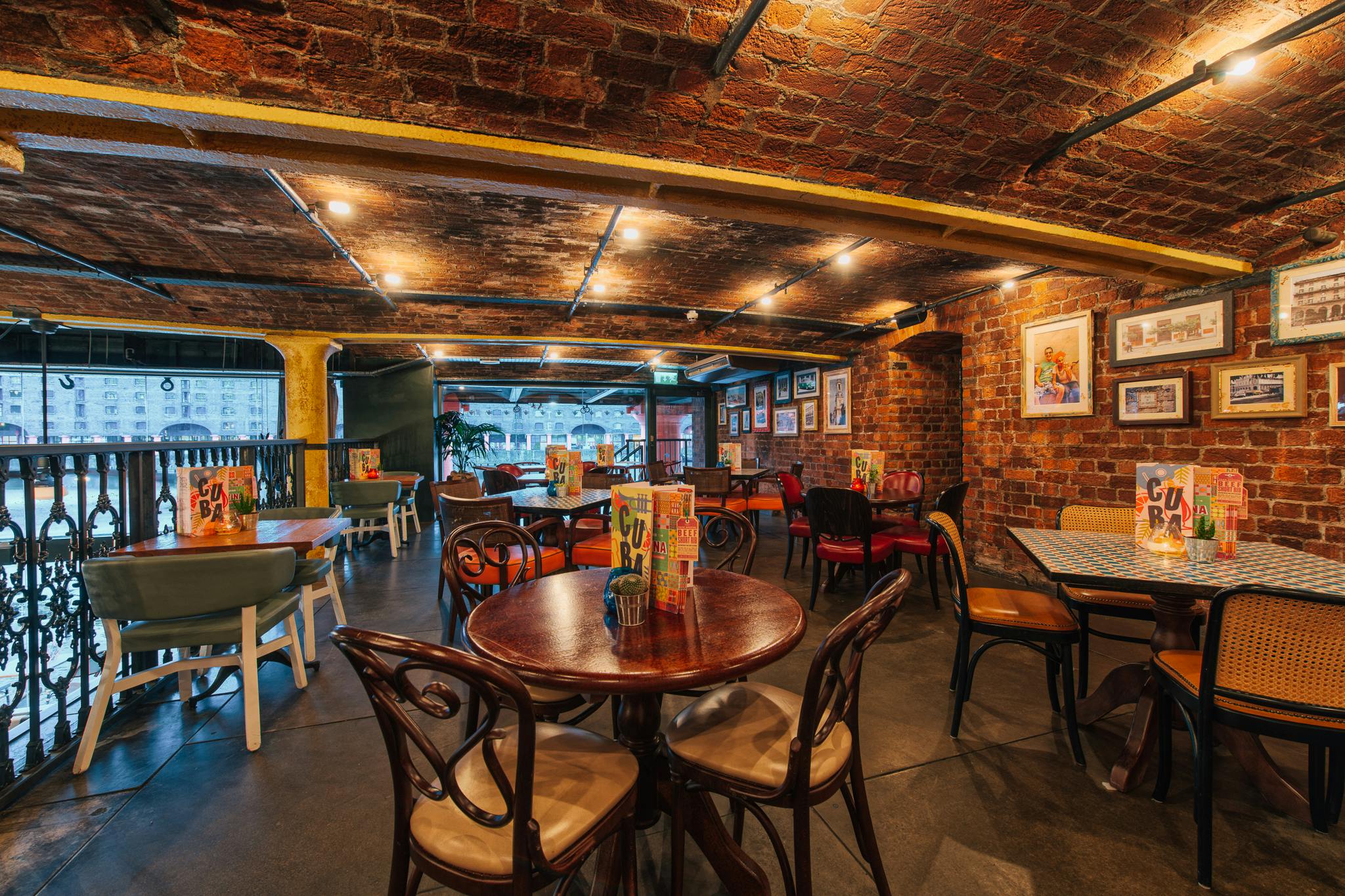 Cozy restaurant with exposed brick, perfect for networking events in Liverpool.