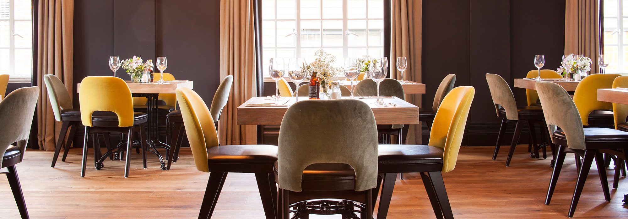 Stylish dining setup at Smith Bar, perfect for corporate meetings and intimate events. - Banner