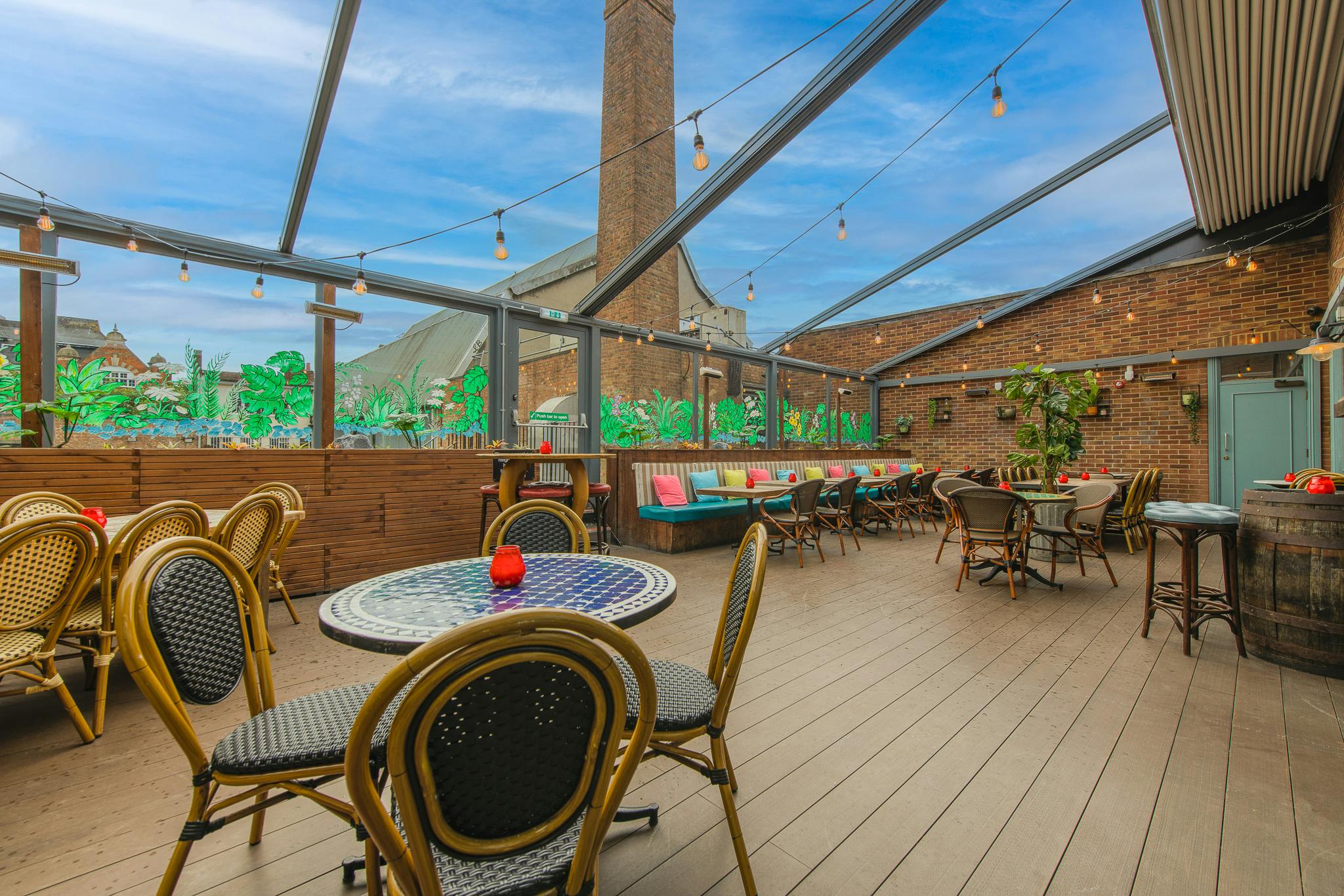 Havana Bar & Roof Terrace: stylish glass-roofed venue for casual gatherings and networking.