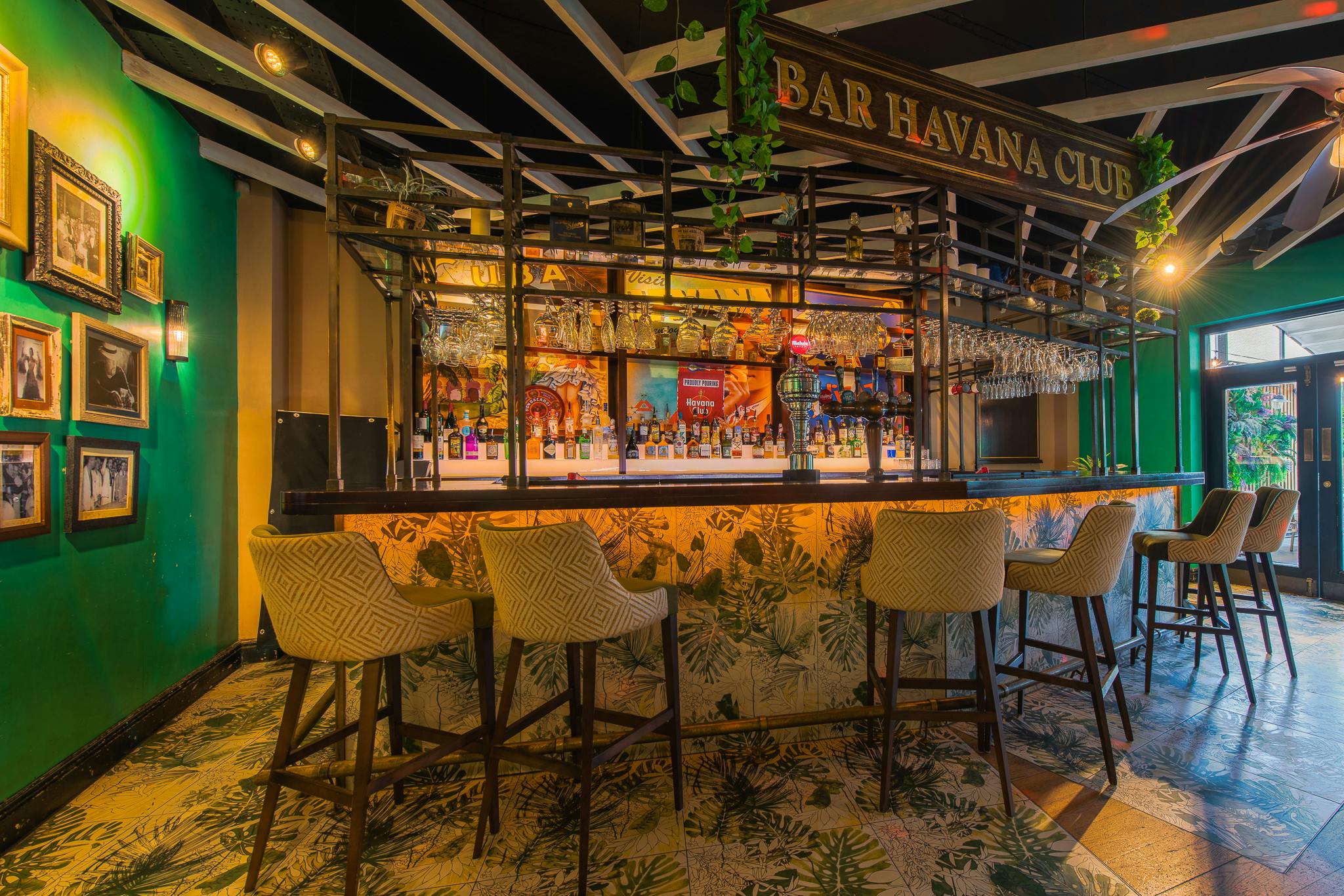 Havana Bar & Roof Terrace: vibrant tropical decor for networking events and cocktail receptions.