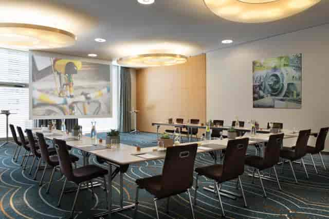 Renaissance Zurich Tower meeting room with U-shaped tables for professional events.
