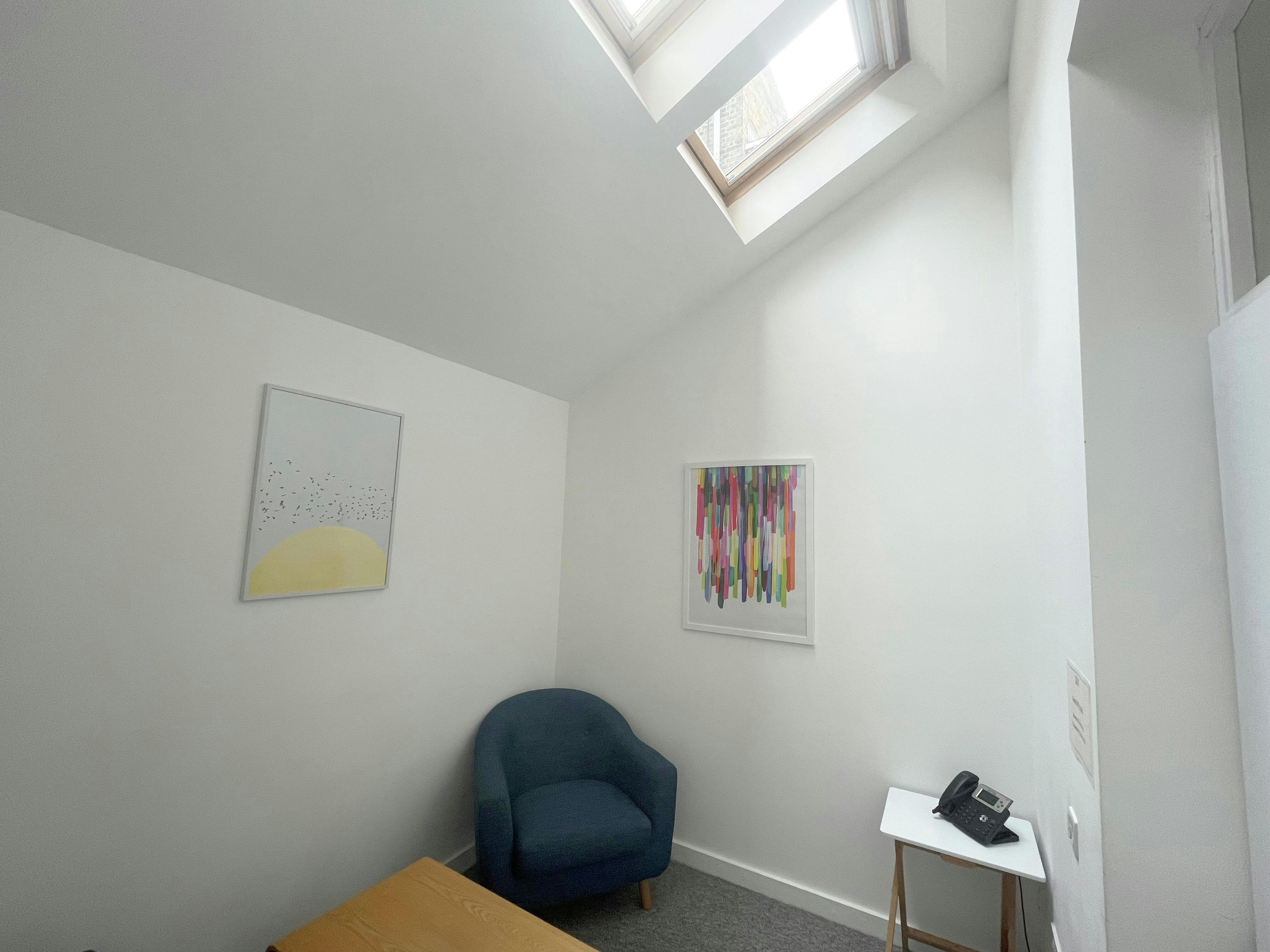 Cozy meeting room with natural light, perfect for brainstorming sessions at Clean Break Studios.