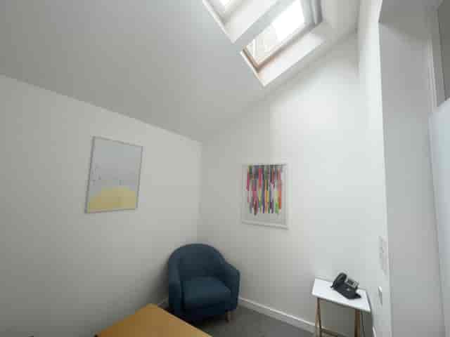 Cozy meeting room with natural light, perfect for brainstorming sessions at Clean Break Studios.