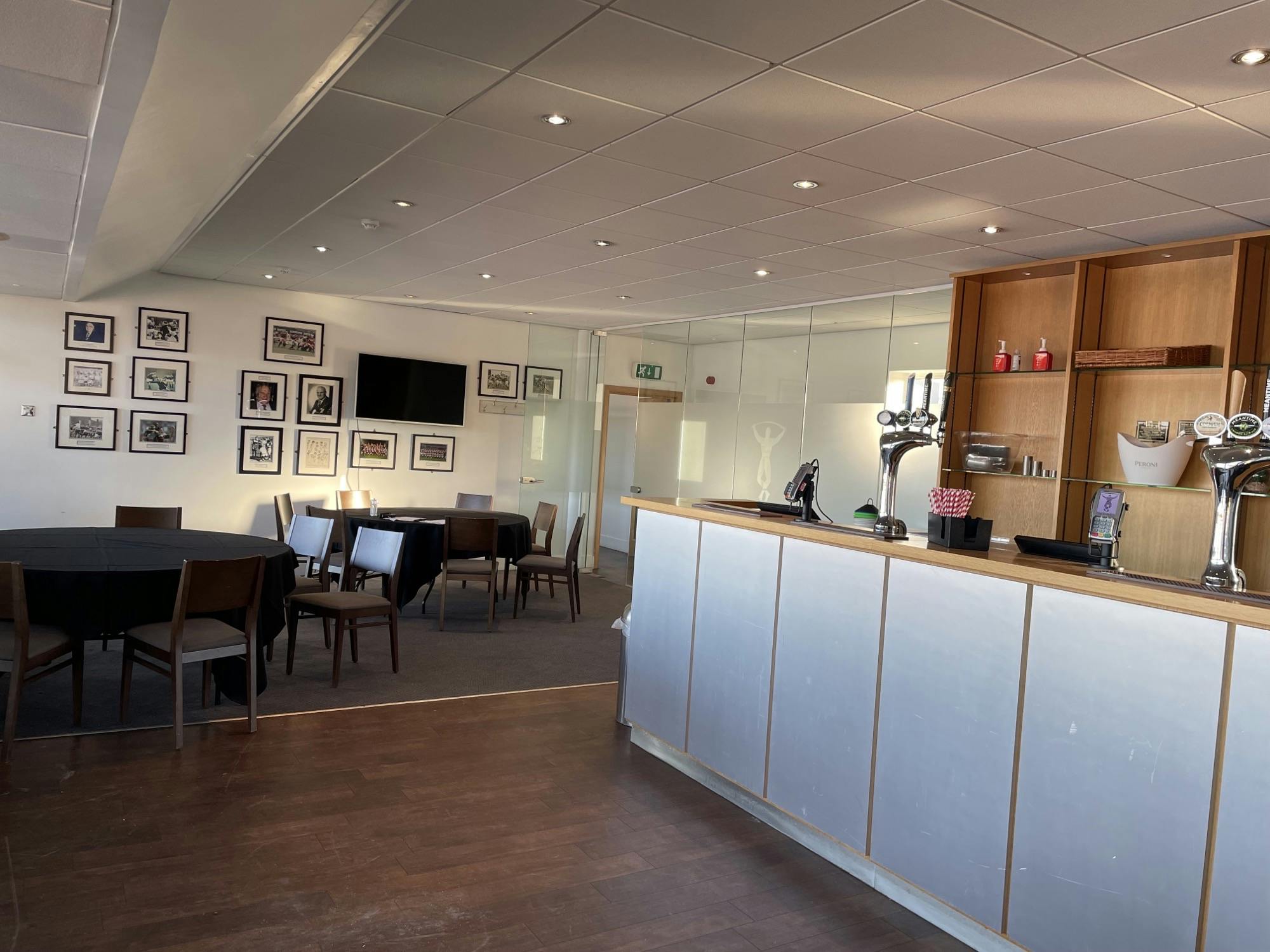 Trustees Lounge at Twickenham Stoop Stadium, versatile event space with sleek bar.