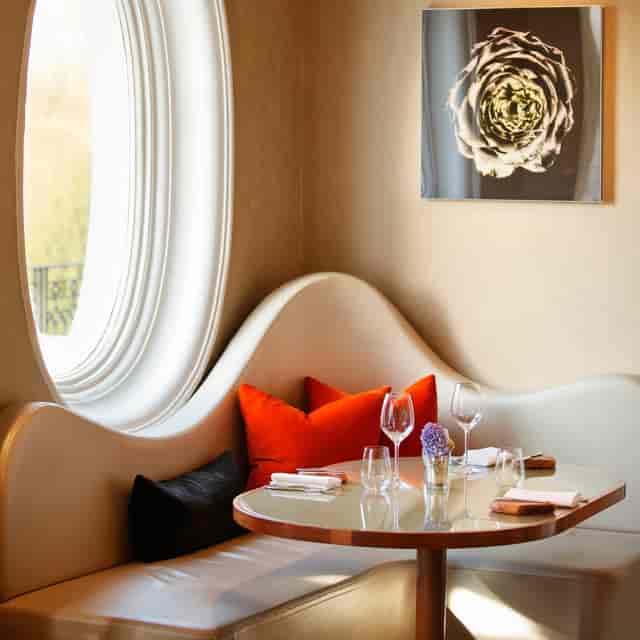 Elegant dining space with cozy seating, perfect for intimate events and client dinners.
