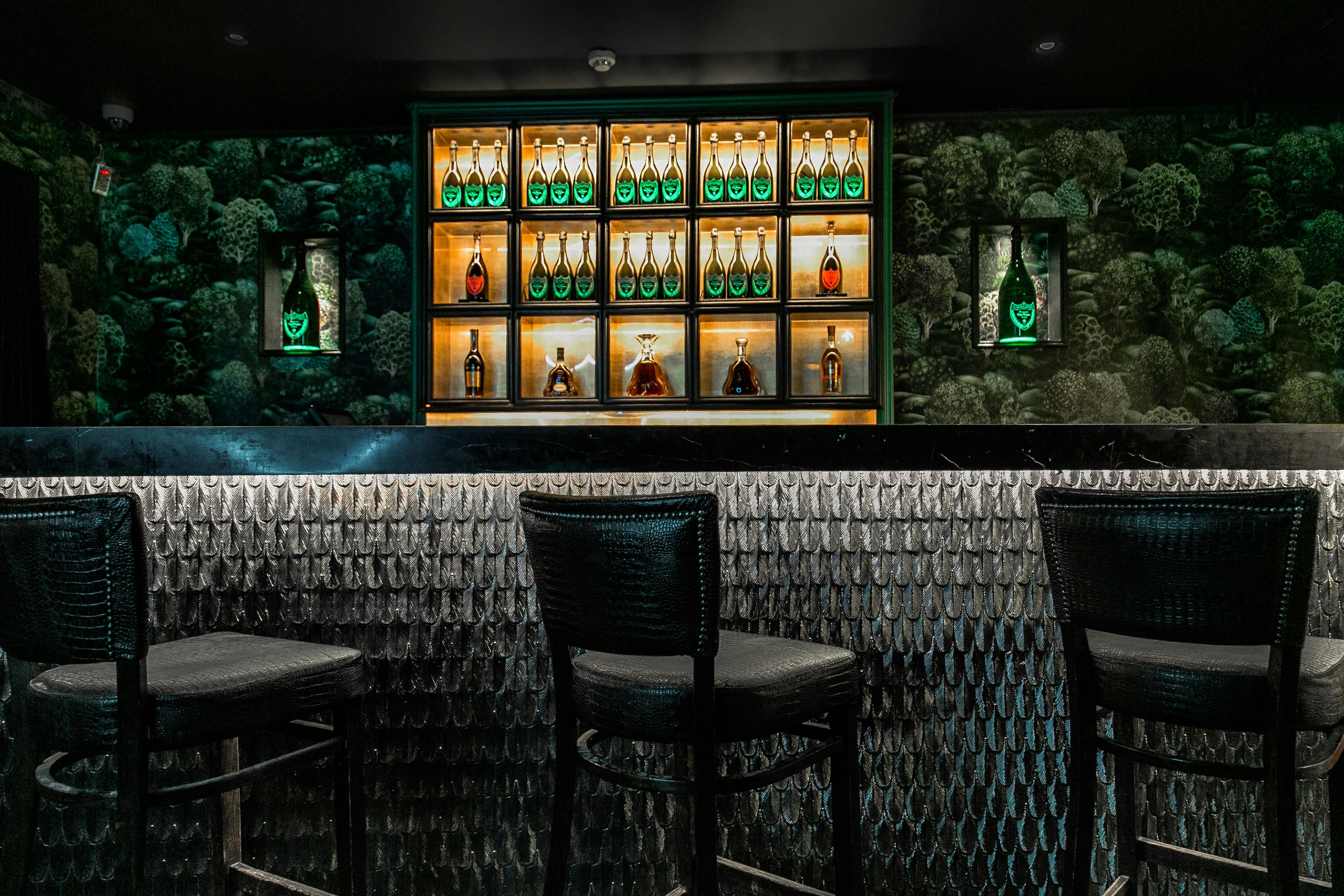 Sleek bar in Green Room, Maddox Club Mayfair for networking events and cocktail receptions.