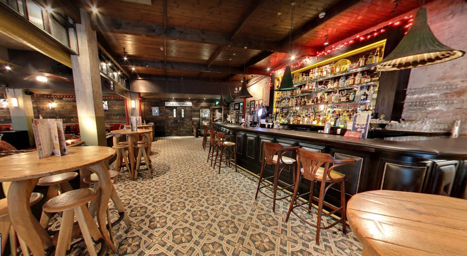 Havana Bar in Cardiff with wooden furniture, ideal for networking events and social gatherings.