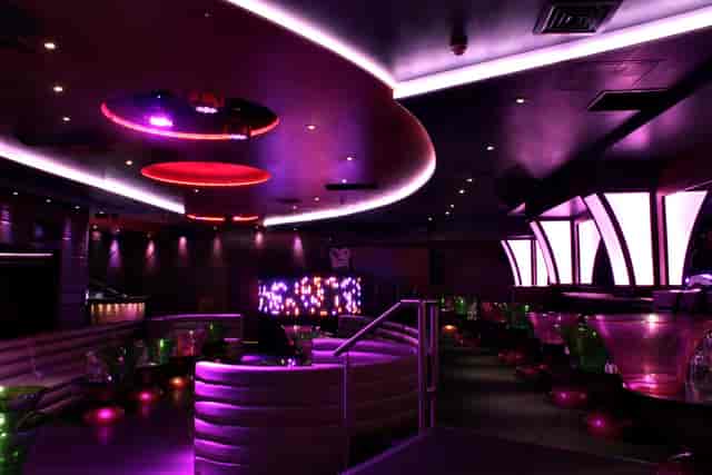 Modern event space at Maddox Club Mayfair with vibrant lighting for cocktail receptions.