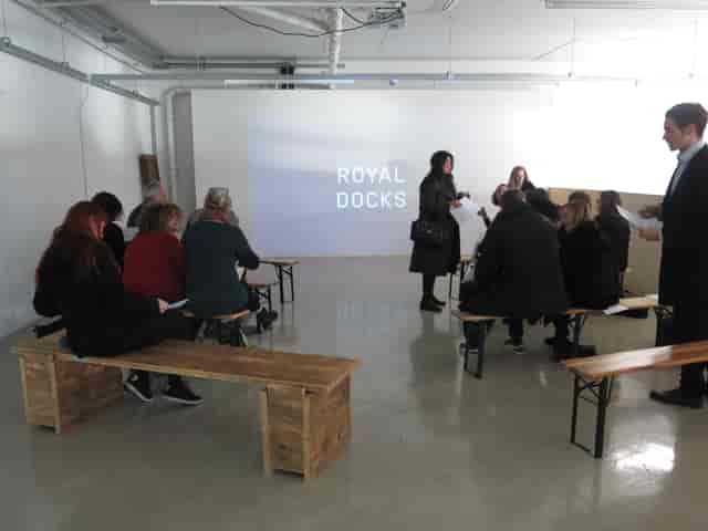 Mezanine Floor at R.A.W Labs, attendees on benches for a workshop event.