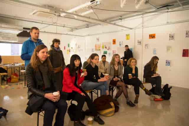 Diverse attendees in a creative workshop on Mezanine Floor at R.A.W Labs.