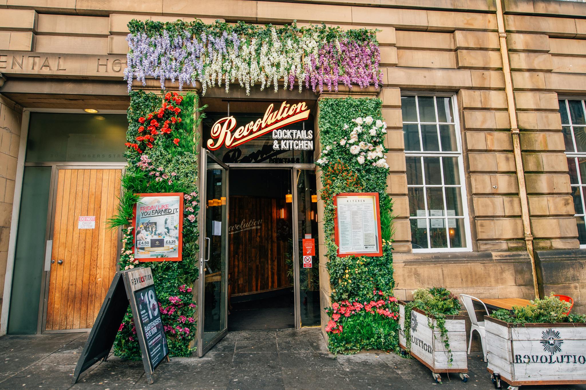 Vibrant entrance with greenery at Revolution Glasgow for outdoor events and receptions.