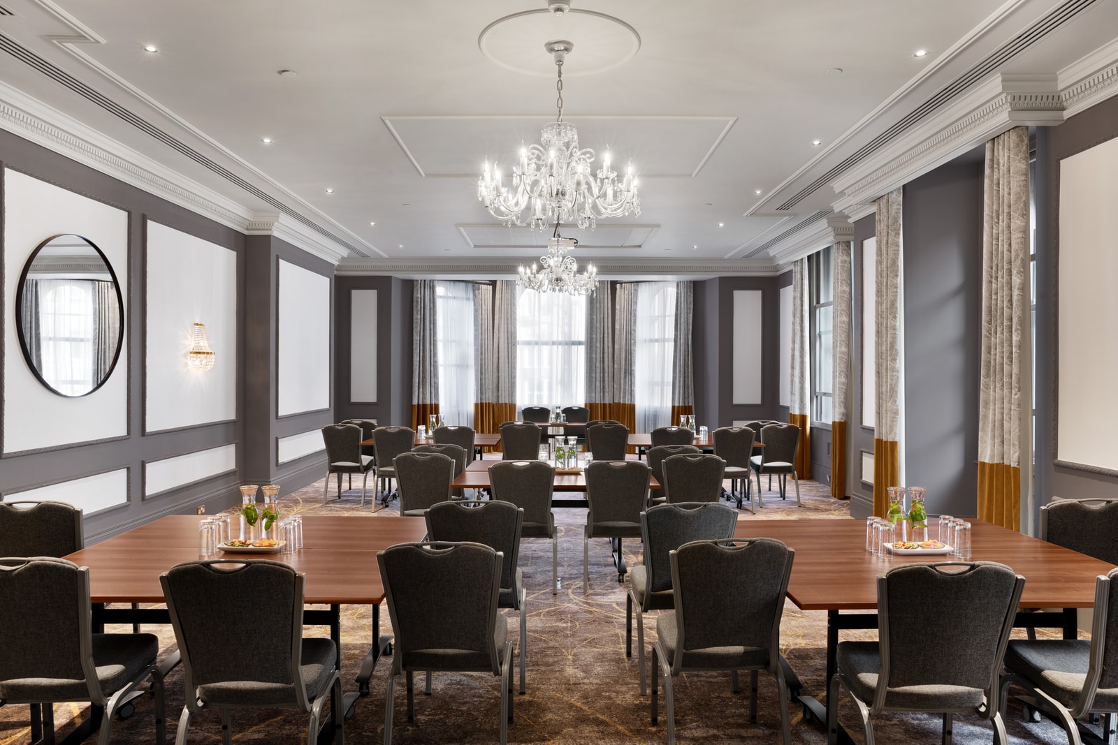 Lancaster Suite boardroom with chandeliers for corporate meetings and executive retreats.