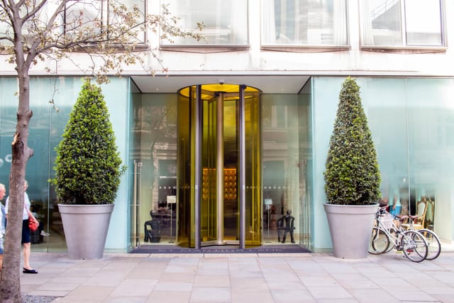 Modern entrance of Studios 1 & 2, St Martins Lane, ideal for upscale events and gatherings.
