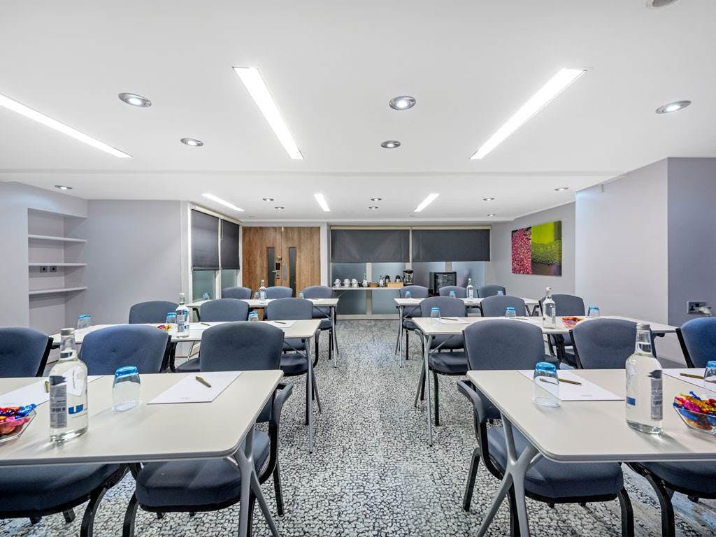 Westbourne Suite Conference Room with natural light for corporate meetings and workshops.