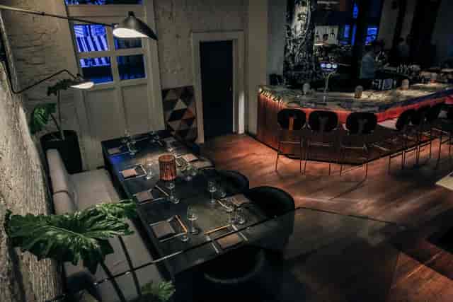 Robata Grill Restaurant: modern event space with ambient lighting for gatherings and meetings.