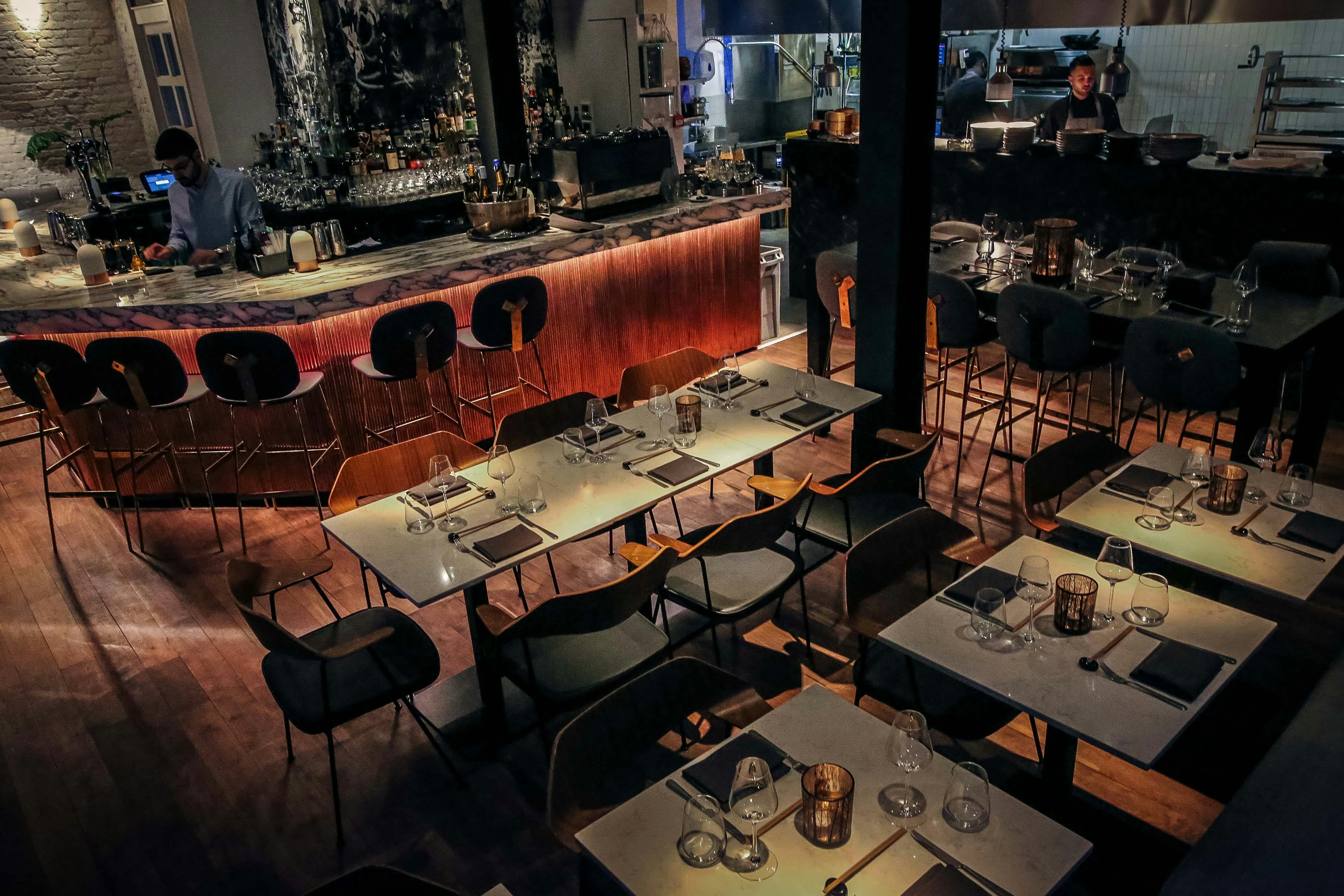 Robata Grill Restaurant: stylish venue with warm lighting for events and gatherings.