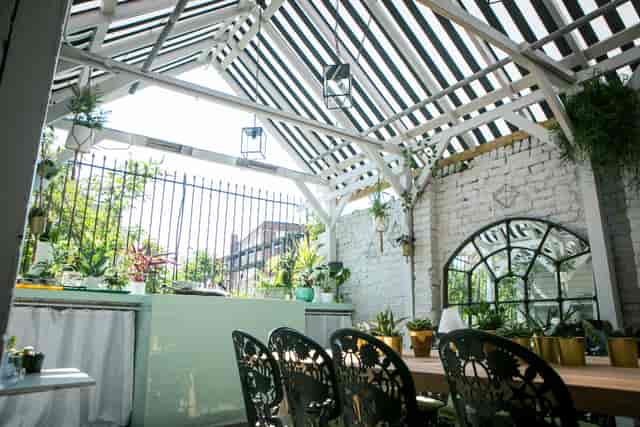 Al Fresco BBQ Garden with high ceiling, ideal for casual meetings and networking events.