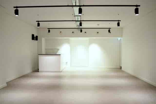 Versatile event space in The Old Street Gallery with adjustable lighting for meetings and workshops.