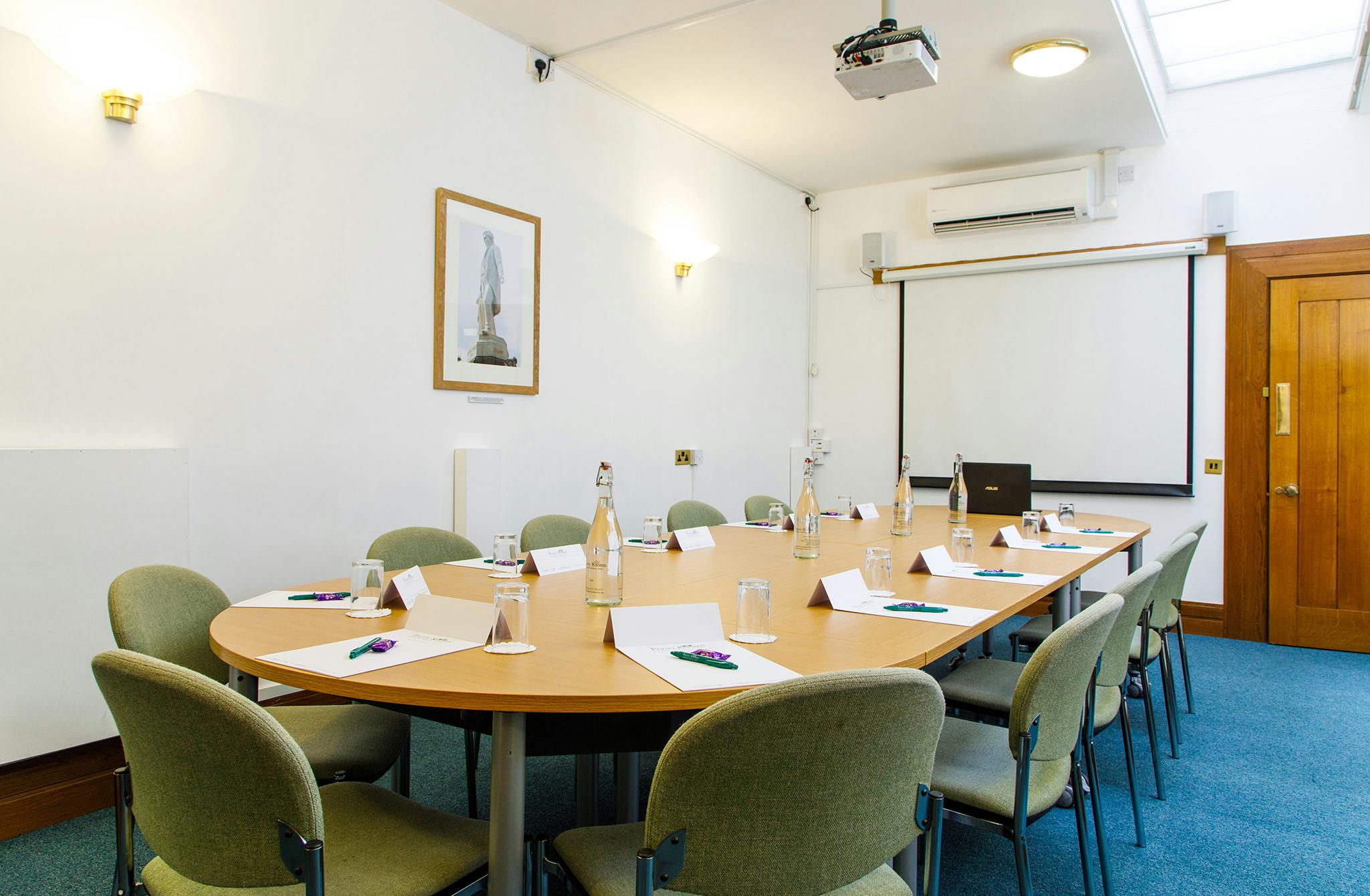 Sturge room at The Priory Rooms: round table meeting space for workshops and conferences.