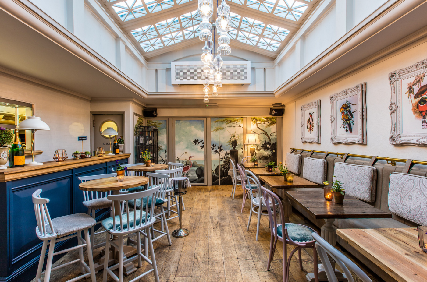 Stylish Semi-private Aviary Room with skylight for intimate events and gatherings in Hollywood.