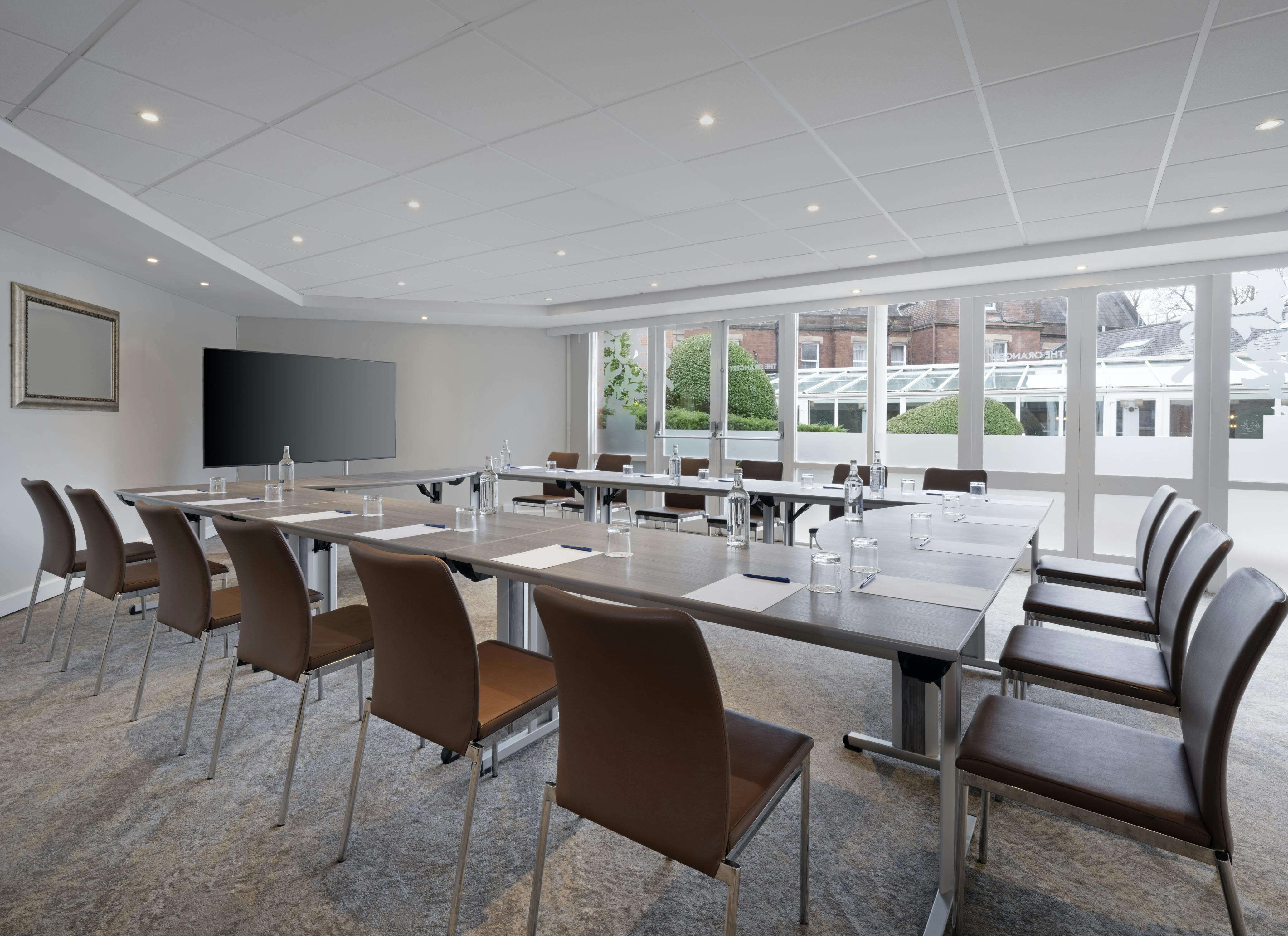 Modern meeting room at Delta Hotels, ideal for professional events and presentations.