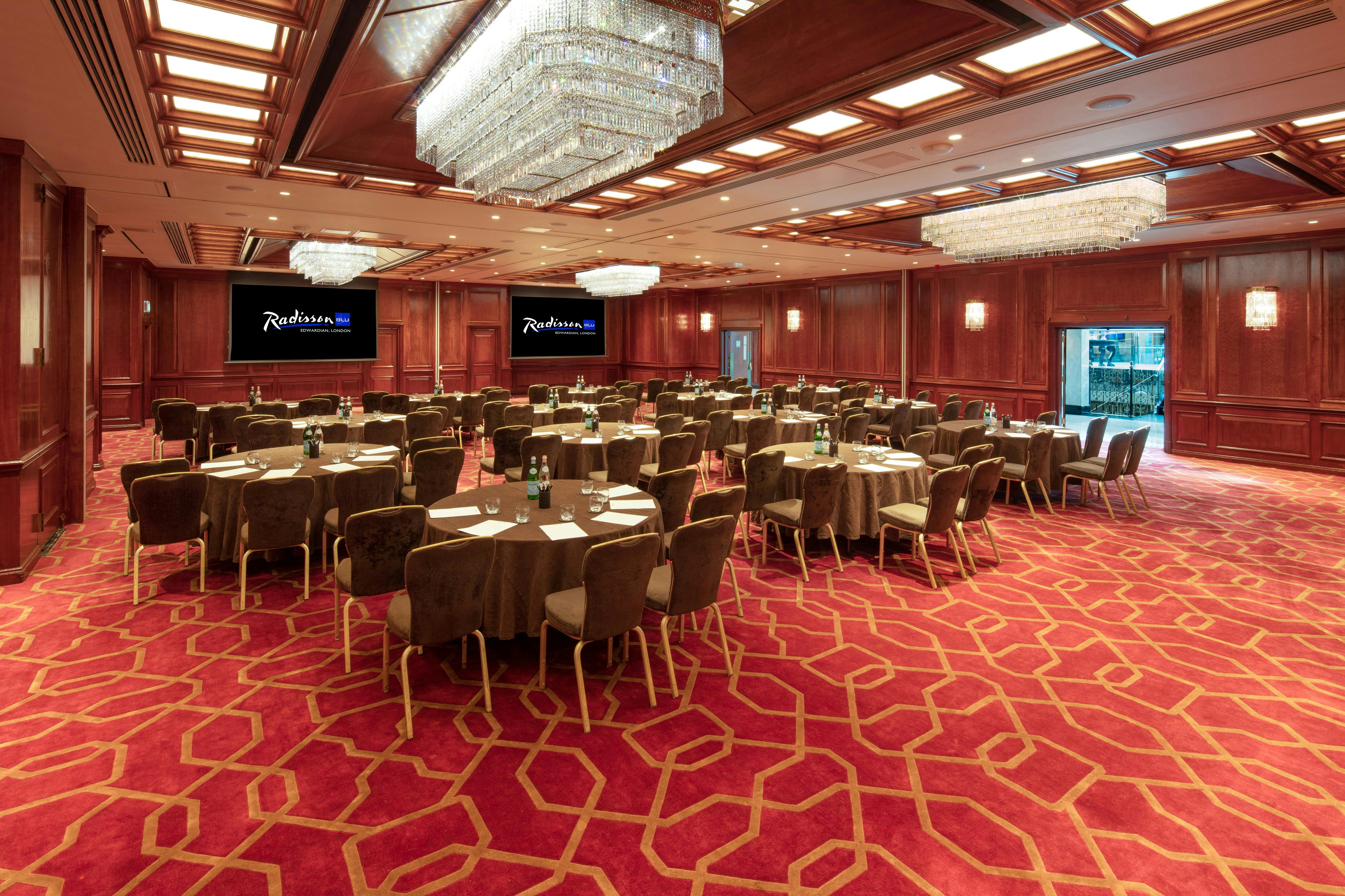 Royal Suite at Radisson Blu Heathrow, elegant tables for corporate events and banquets.