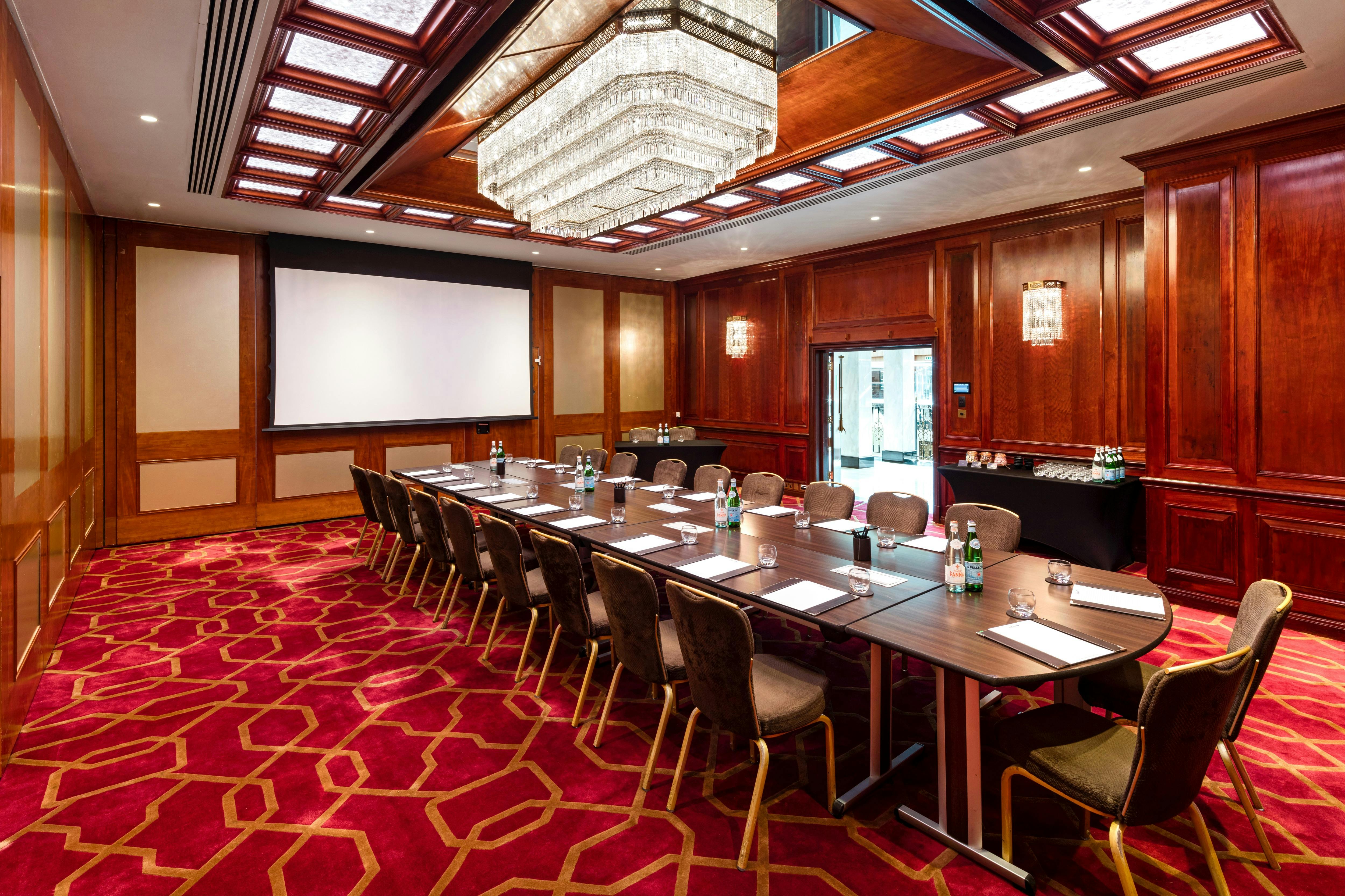 Elegant meeting room at Radisson Blu Heathrow, perfect for corporate events and presentations.