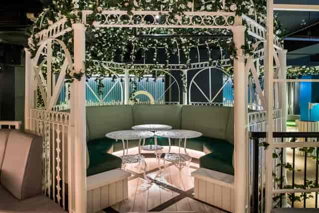 Pergolas at Swingers West End, cozy gazebo for networking and casual meetings.
