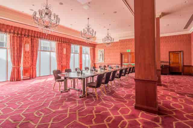 Private Room 38 at Radisson Blu Heathrow, elegant meeting space with rich decor.