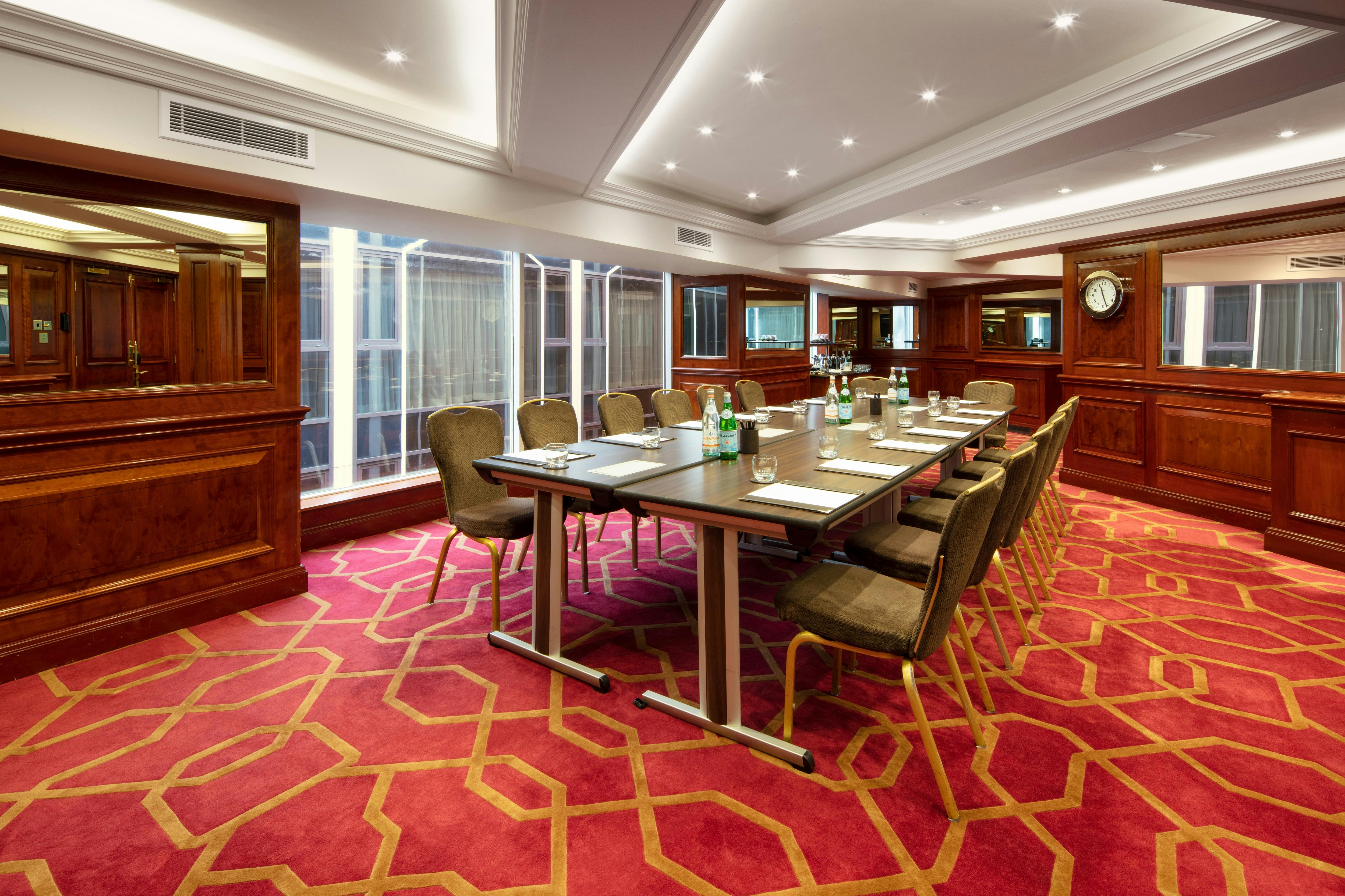 Private Room 40 at Radisson Blu Heathrow, elegant meeting space with natural light.