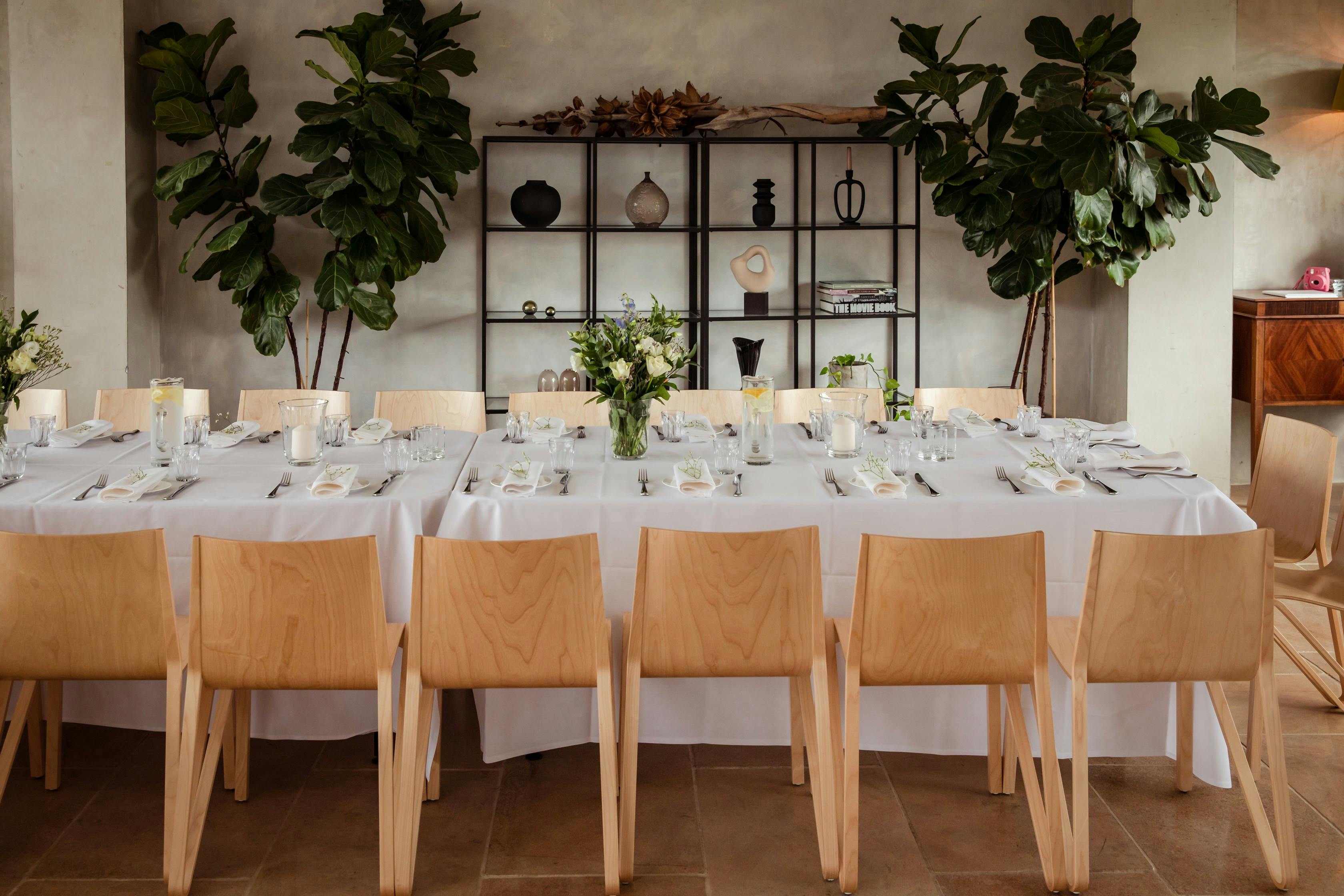 Elegant dining setup in Menier Penthouse for intimate events and corporate dinners.