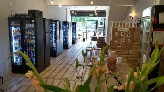 Modern venue with natural light, ideal for casual meetings and events.