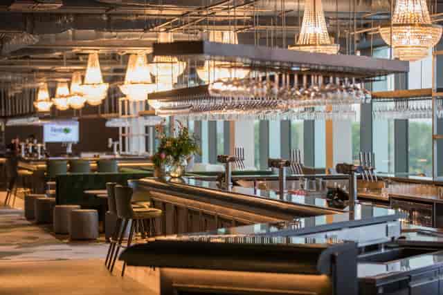 East Wing at Allianz Stadium: modern event space with elegant bar for receptions and gatherings.