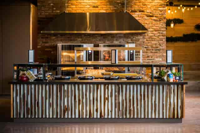 British Airways Rose Garden catering station with rustic design at Twickenham event.