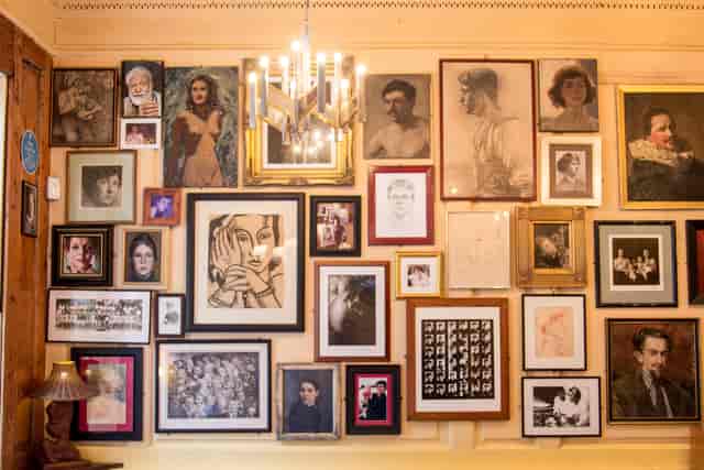 Dining Room at The Union Club with vibrant gallery wall, perfect for events and gatherings.